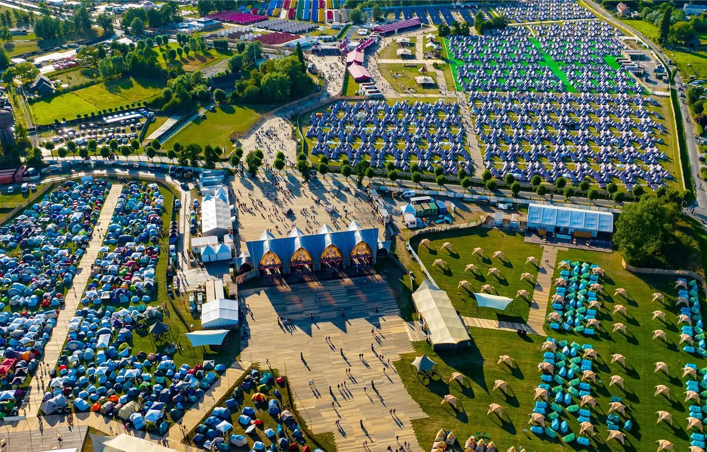 Aerial view of Dreamville: rows of Easy Tents, the Marketplace and the camping zones